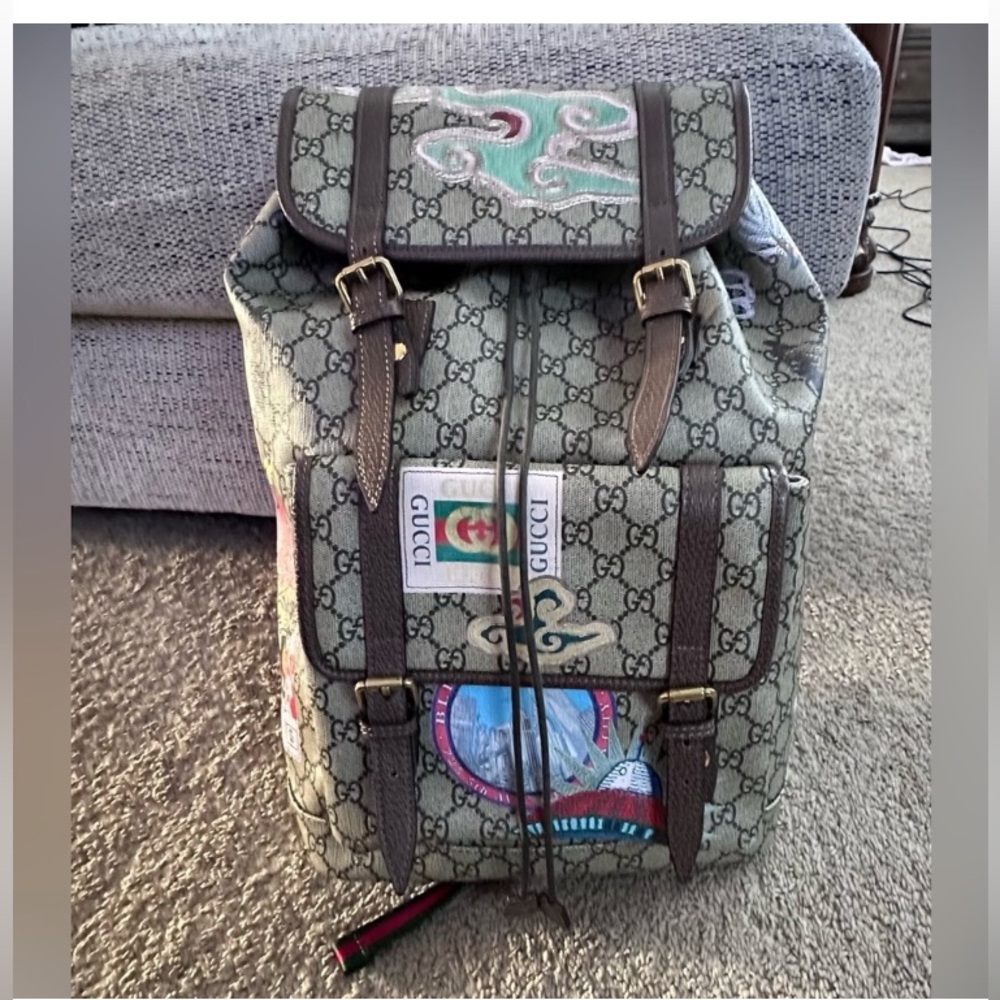Flawed gucci supreme courier backpack—-